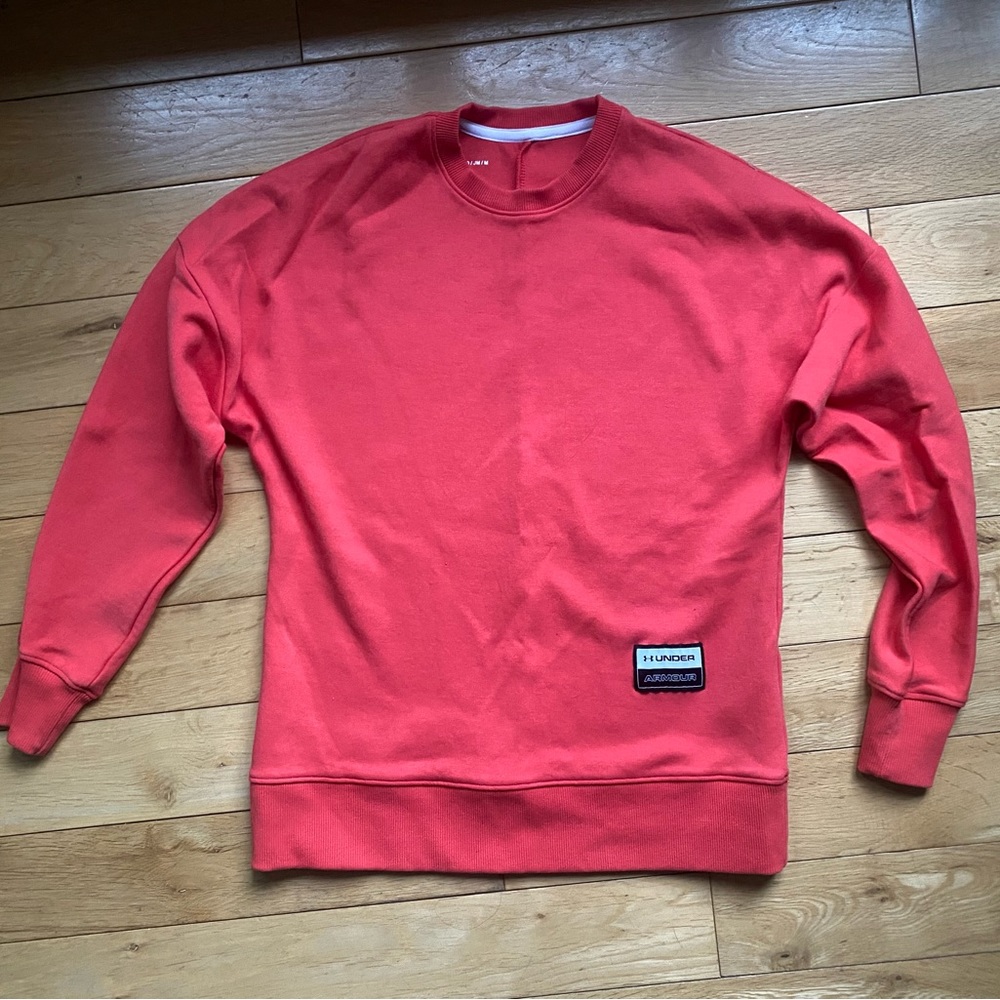 Under Armour never worn red sweatshirt youth medium. New without tags.
